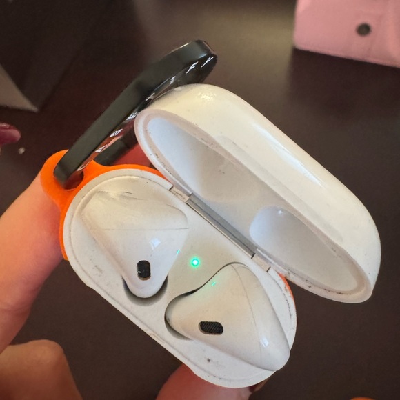 AirPods with charging case and case